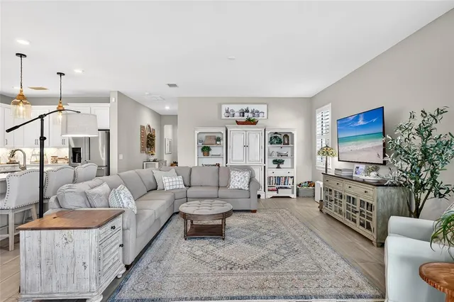 a kitchen with stainless steel appliances a stove a microwave and cabinets