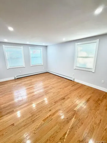 a bathroom with a sink a toilet and a bathtub