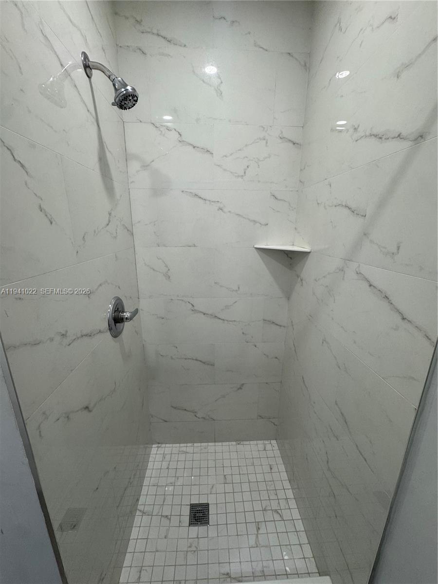 4081 Southwest 97th Court, Unit 1 Miami, FL 33165 - Photo 3 of 3 a bathroom with a shower