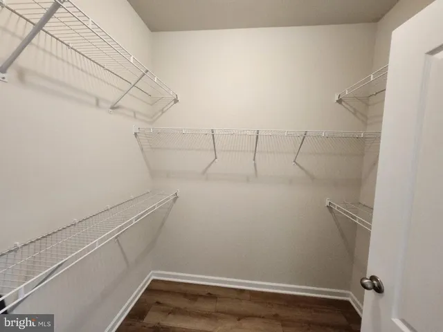 a view of a room with racks on the wall