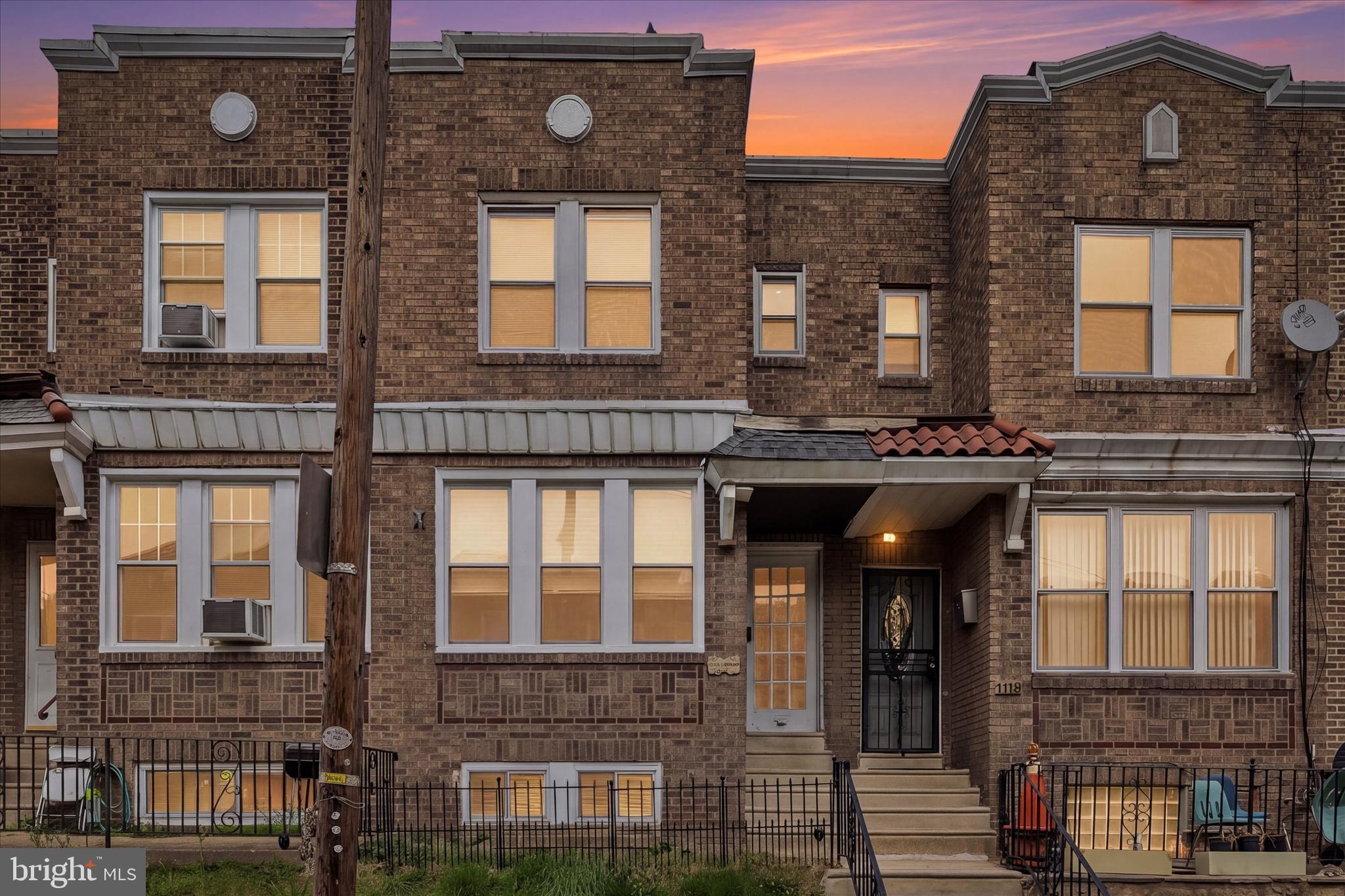 1117 Rosalie Street, Unit 1 Philadelphia, PA 19149 - Photo 1 of 30 front view of a brick building