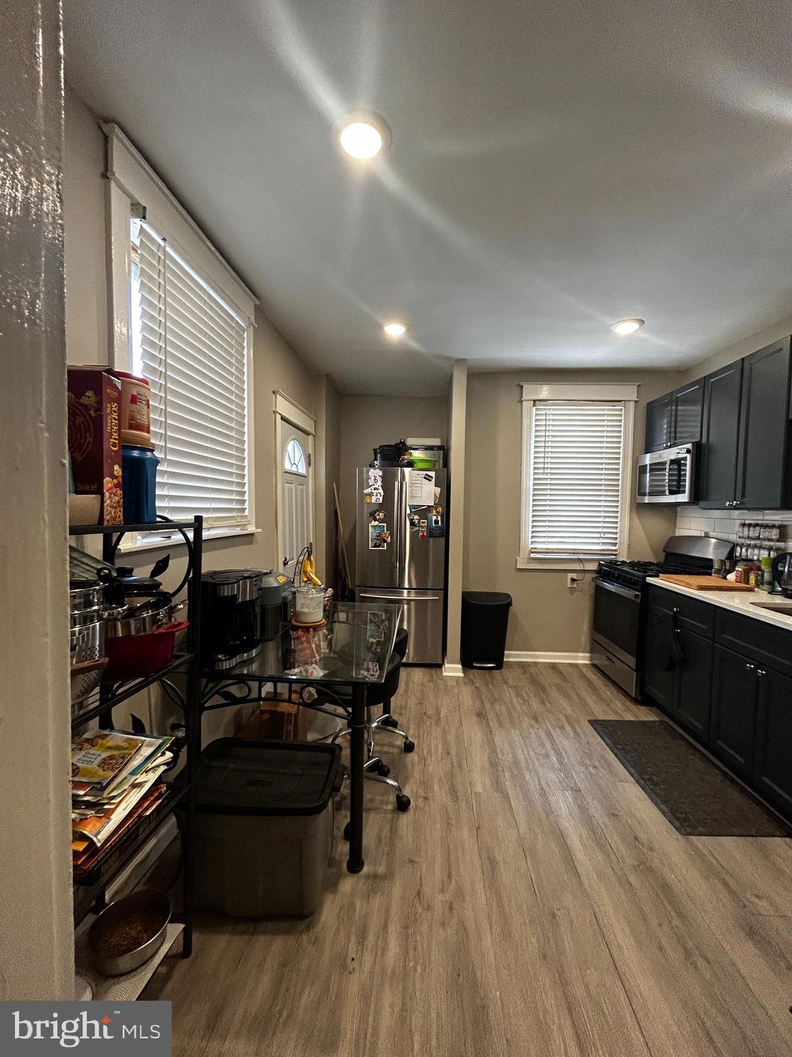 1117 Rosalie Street, Unit 1 Philadelphia, PA 19149 - Photo 12 of 29 a large kitchen with lots of counter top space and stainless steel appliances