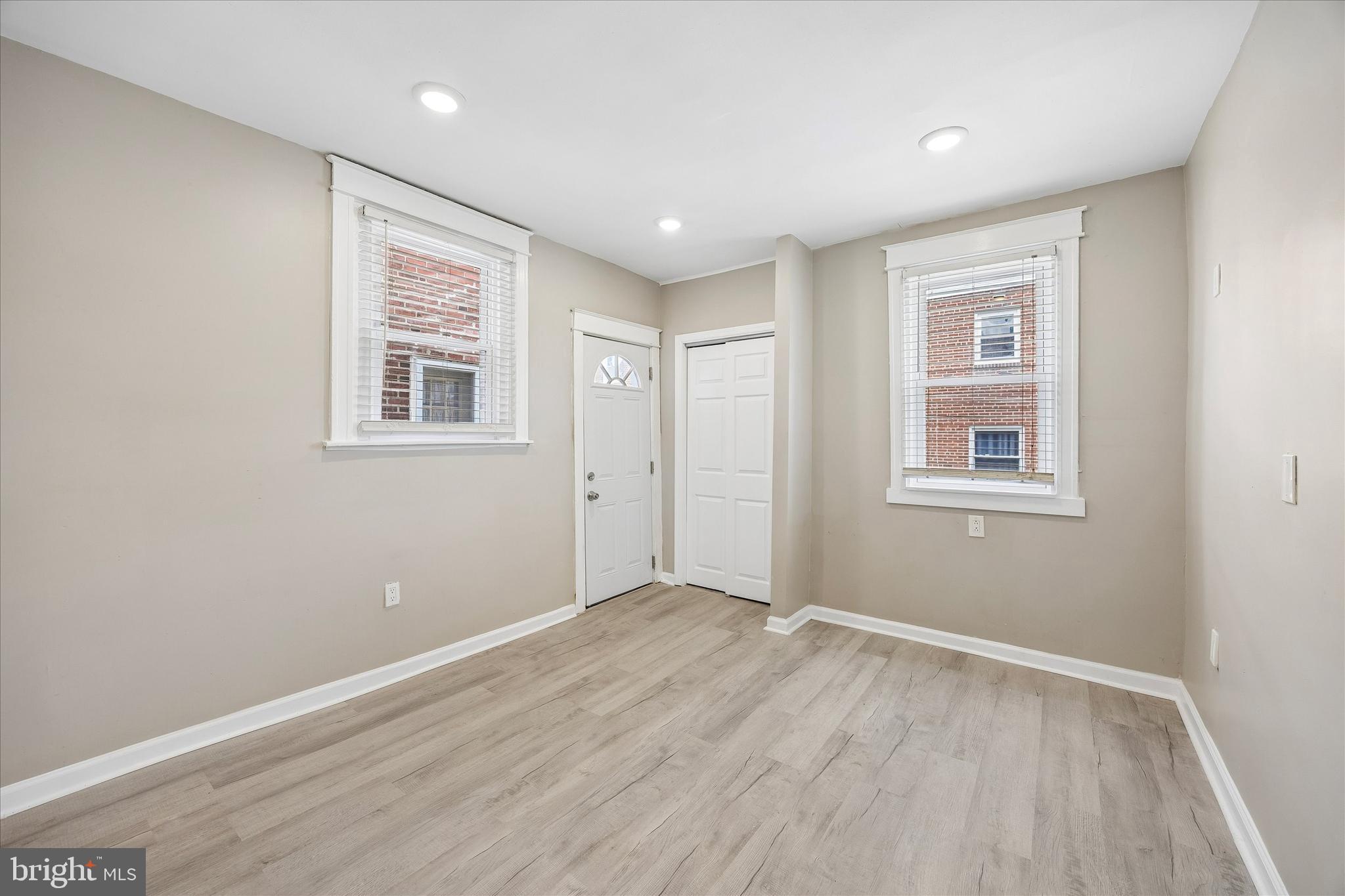 1117 Rosalie Street, Unit 1 Philadelphia, PA 19149 - Photo 16 of 30 a view of a big room with wooden floor and windows