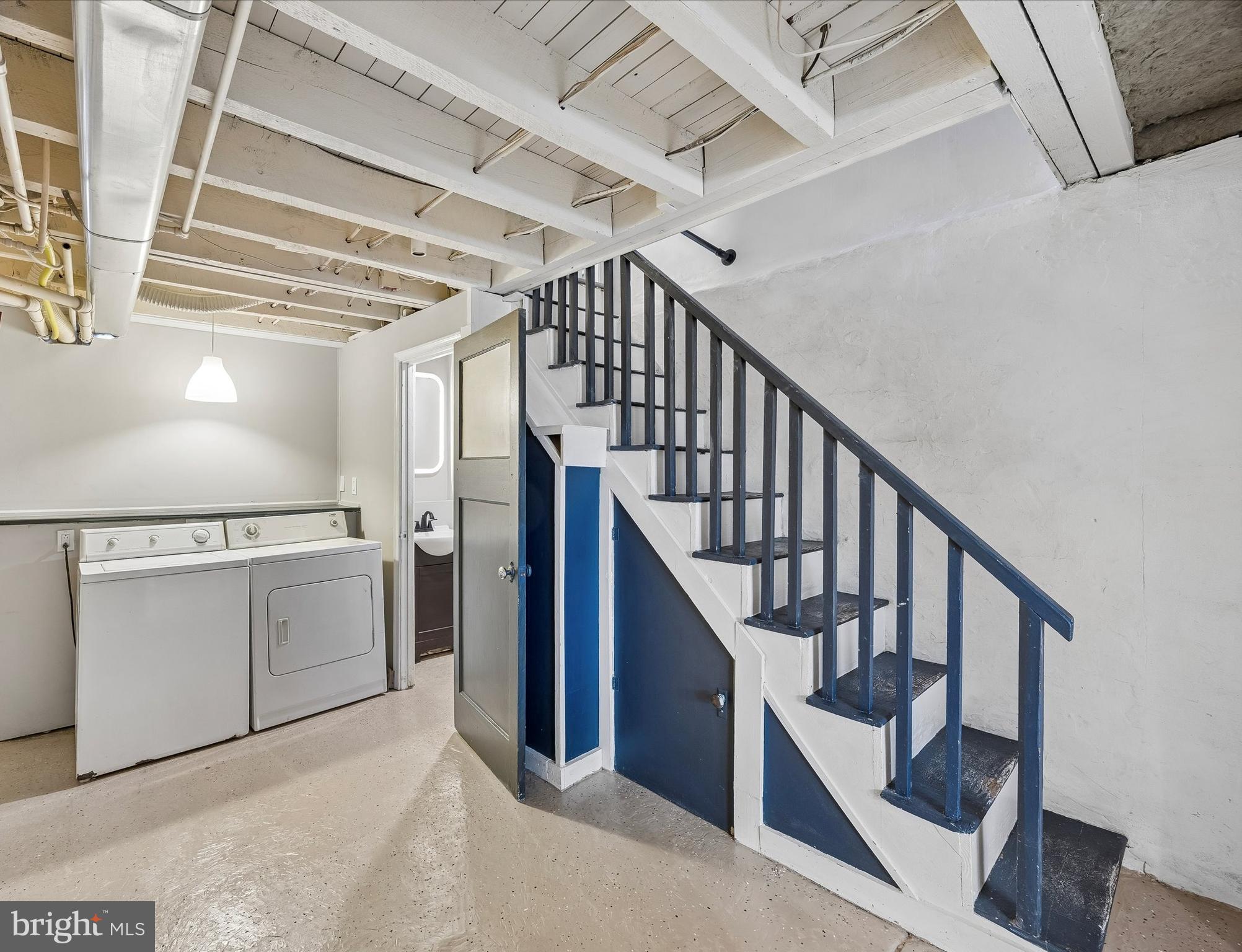 1117 Rosalie Street, Unit 1 Philadelphia, PA 19149 - Photo 20 of 30 a view of staircase with washer and dryer
