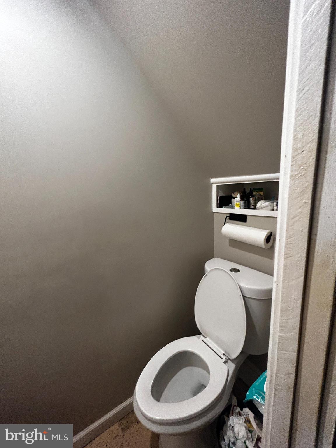 1117 Rosalie Street, Unit 1 Philadelphia, PA 19149 - Photo 22 of 29 a white toilet sitting next to a small sink