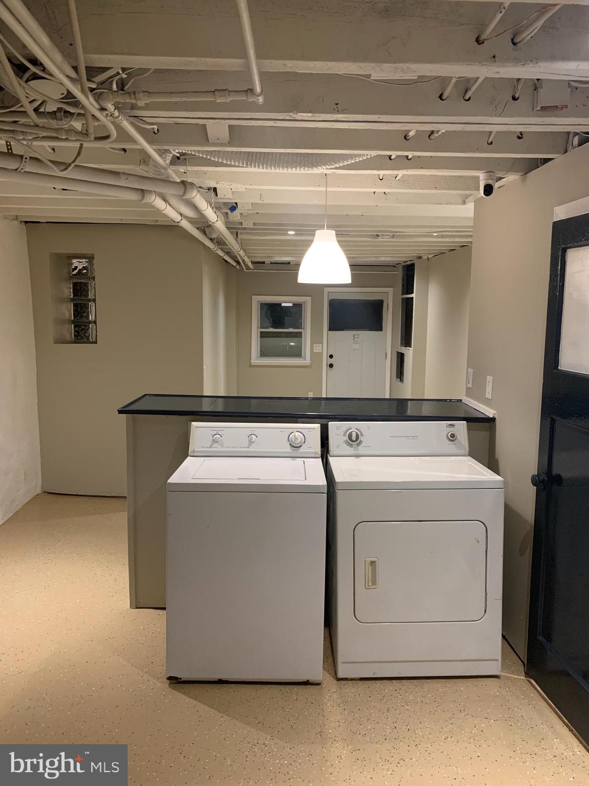 1117 Rosalie Street, Unit 1 Philadelphia, PA 19149 - Photo 23 of 29 a utility room with dryer and washer