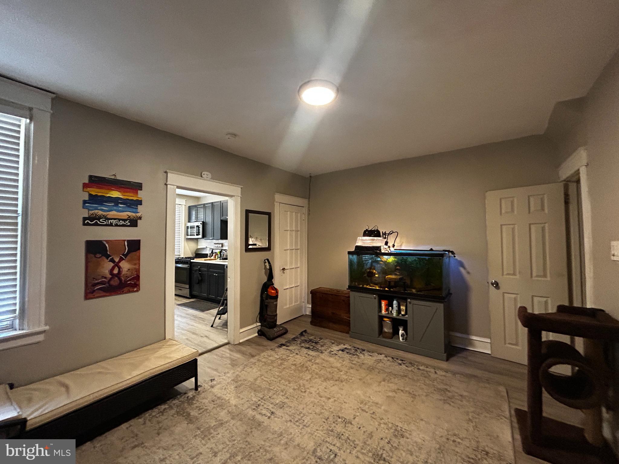 1117 Rosalie Street, Unit 1 Philadelphia, PA 19149 - Photo 6 of 29 a bedroom with furniture and a window