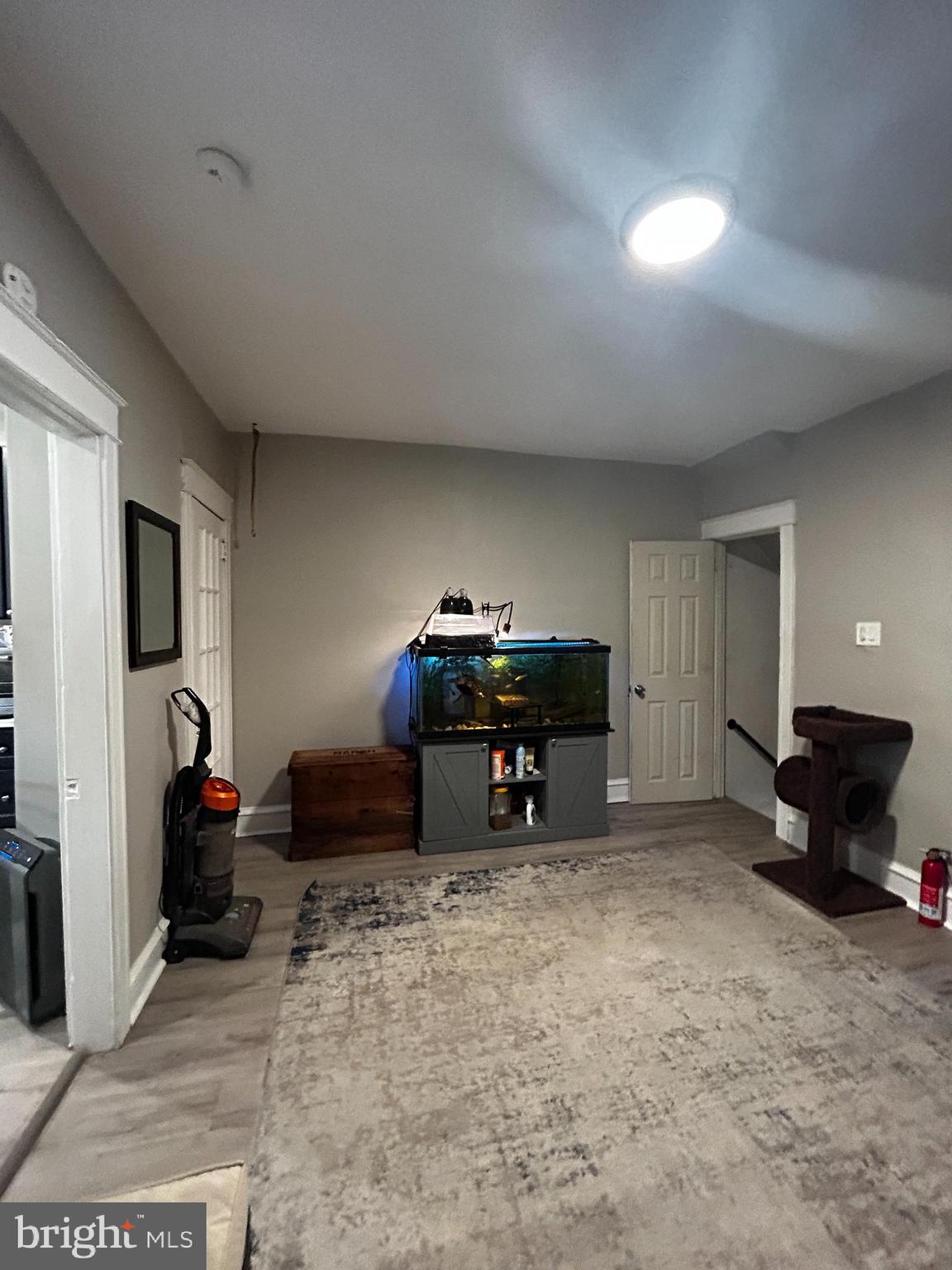 1117 Rosalie Street, Unit 1 Philadelphia, PA 19149 - Photo 7 of 29 a living room with furniture and a piano