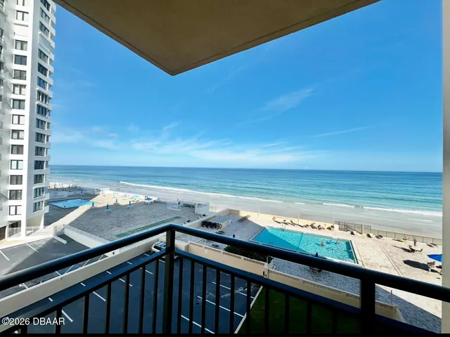 a view of a balcony with an outdoor space