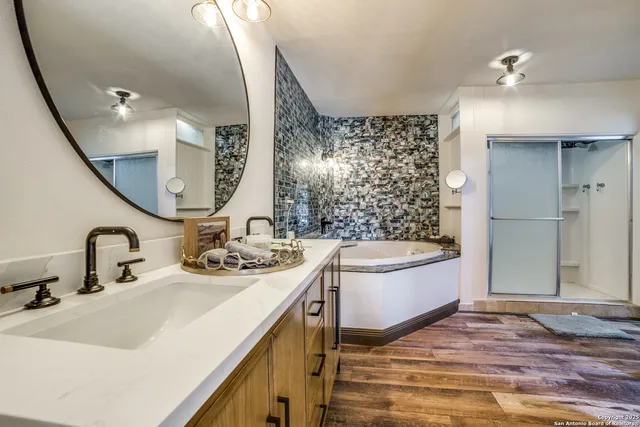 a bathroom with a sink and a mirror