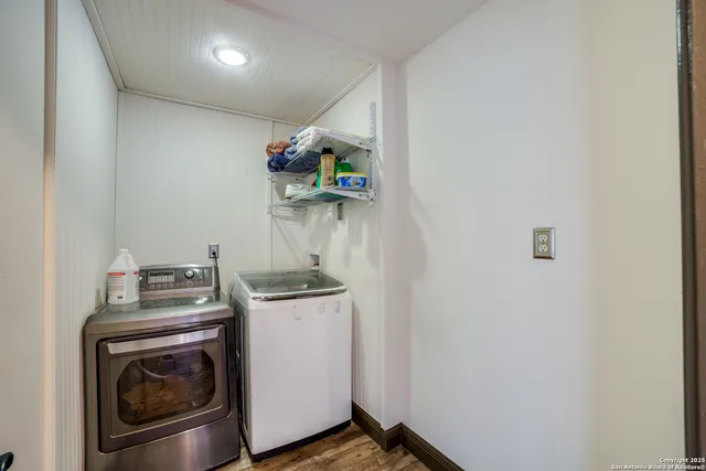 a utility room with dryer and washer