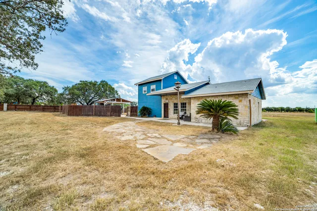 a front view of house with yard