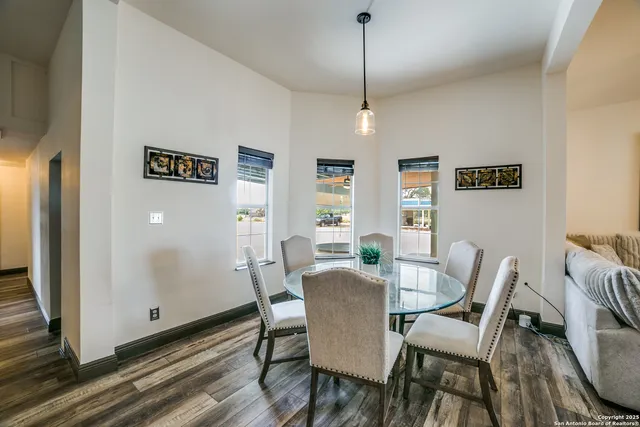 a view of a dining room with furniture