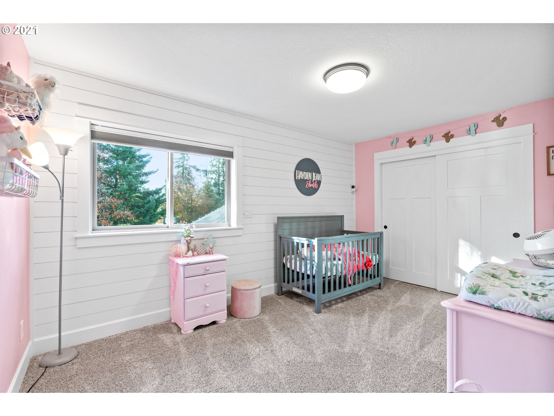 15695 South Carus Road Oregon City, OR 97045 - Photo 18 of 32 a bedroom with a bed and a window