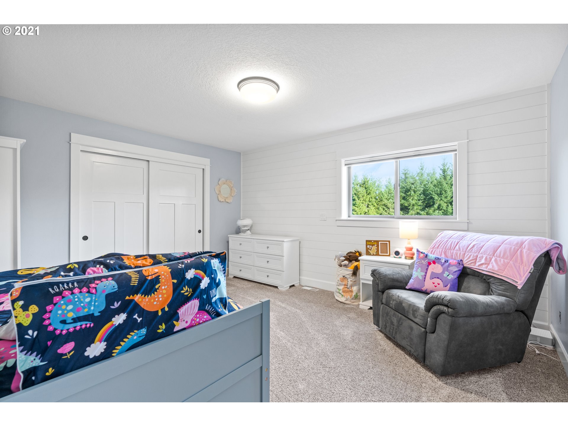 15695 South Carus Road Oregon City, OR 97045 - Photo 19 of 32 a living room with furniture and toys