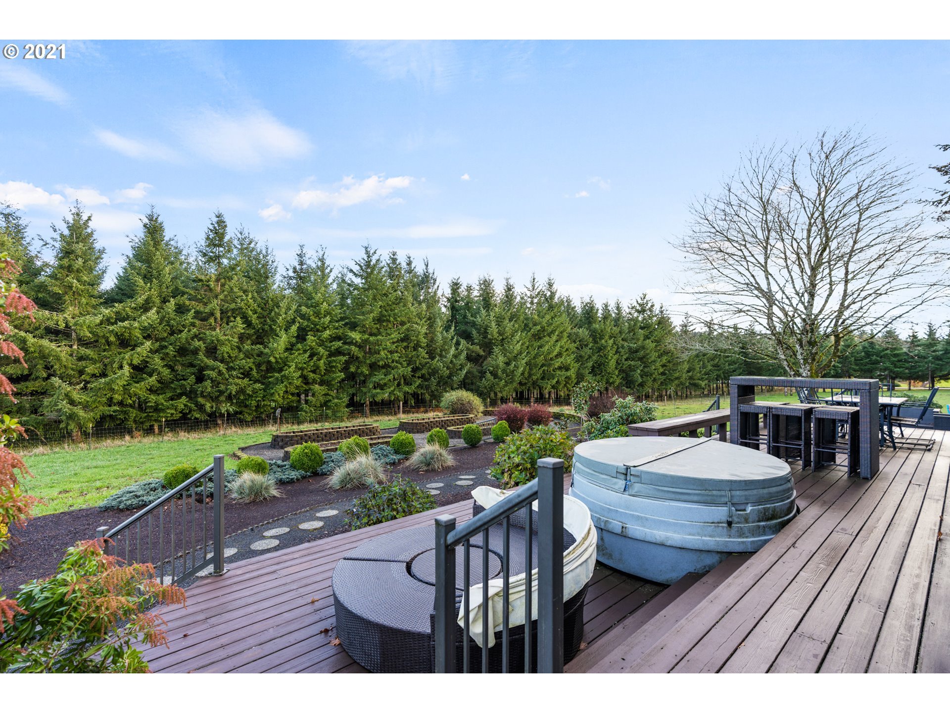 15695 South Carus Road Oregon City, OR 97045 - Photo 23 of 32 a view of a backyard with sitting area