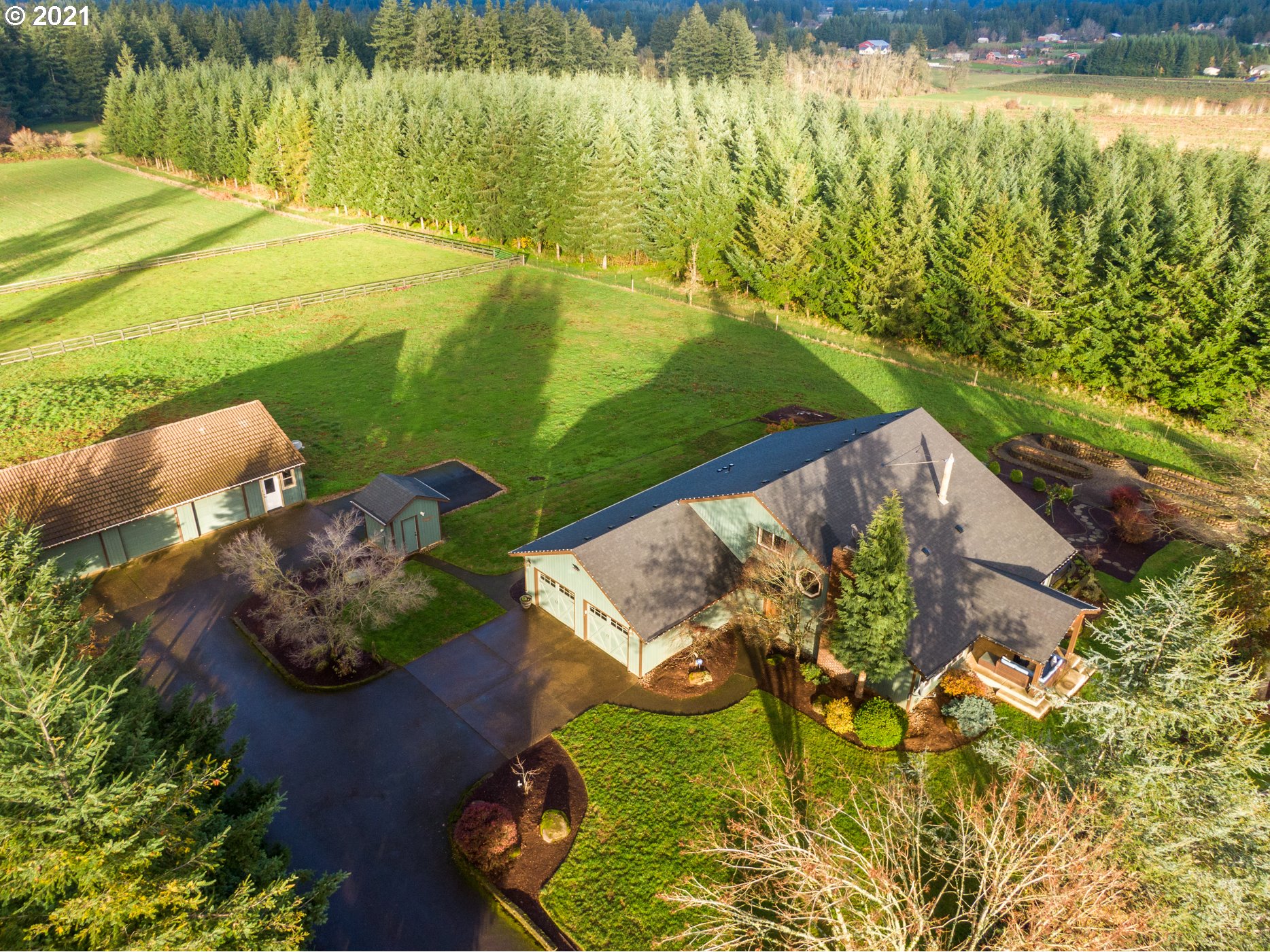 15695 South Carus Road Oregon City, OR 97045 - Photo 29 of 32 a view of a lake with a yard