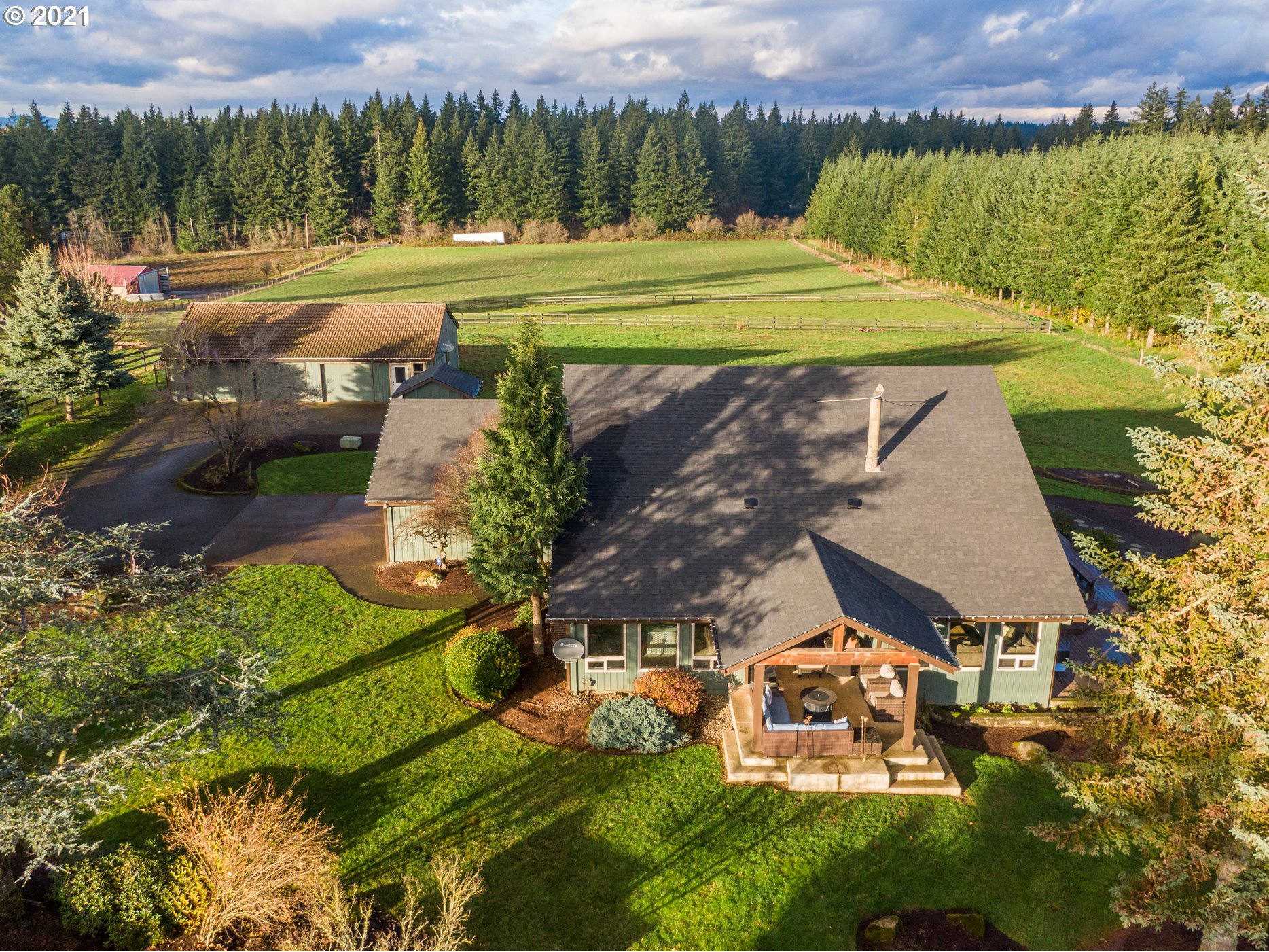 15695 South Carus Road Oregon City, OR 97045 - Photo 31 of 32 an aerial view of a house with a yard