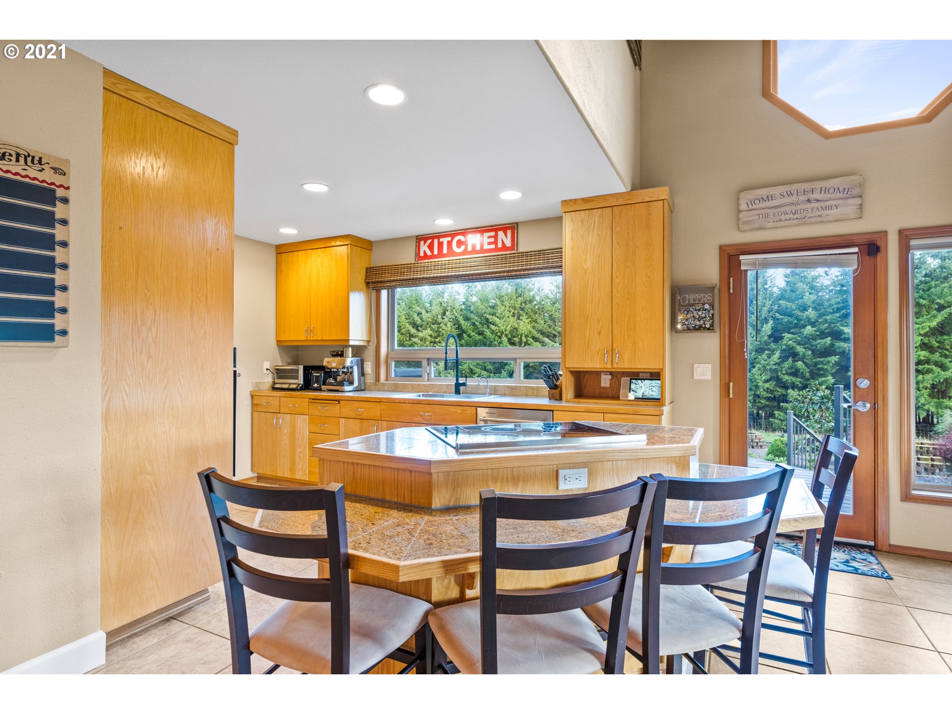 15695 South Carus Road Oregon City, OR 97045 - Photo 5 of 32 a dining room with furniture and a floor to ceiling window