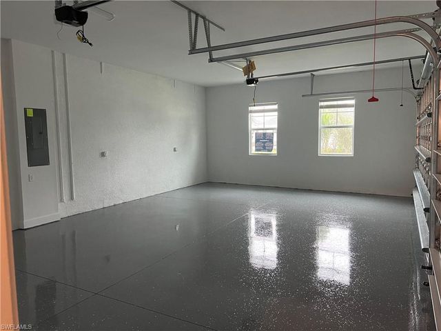 a view of empty room with windows