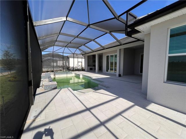 a view of a backyard of a house