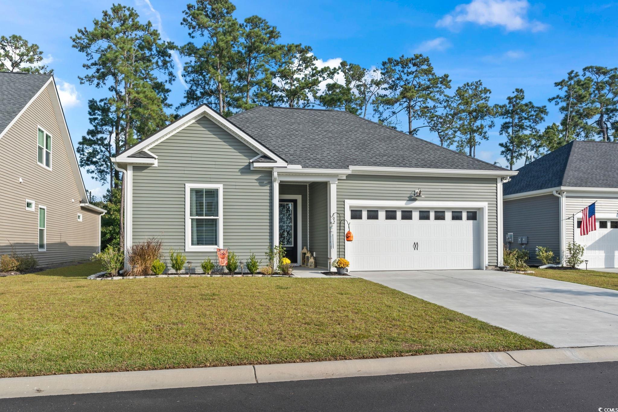 502 Bumble Circle Murrells Inlet, SC 29576 - Photo 1 of 39 View of front of home featuring a front yard and a