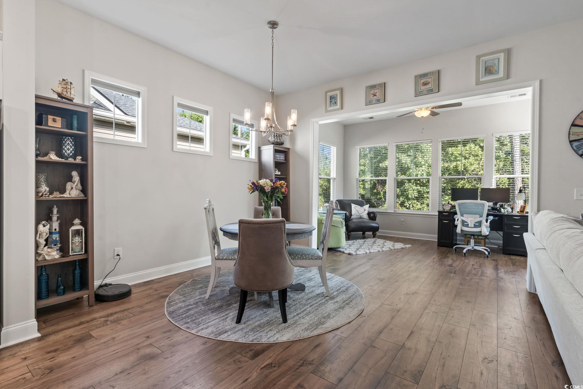 502 Bumble Circle Murrells Inlet, SC 29576 - Photo 13 of 39 Dining area with ceiling fan with notable chandeli