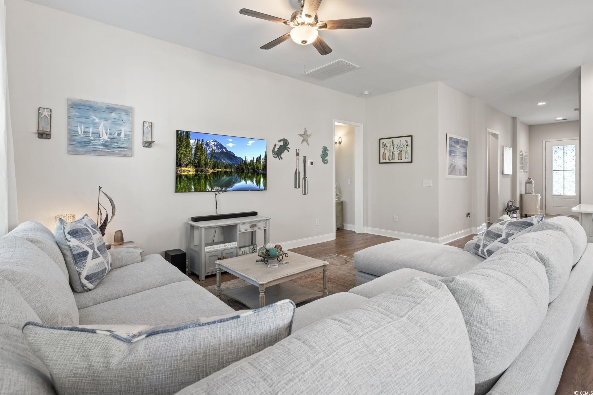 502 Bumble Circle Murrells Inlet, SC 29576 - Photo 14 of 39 Living room with ceiling fan and dark hardwood / w