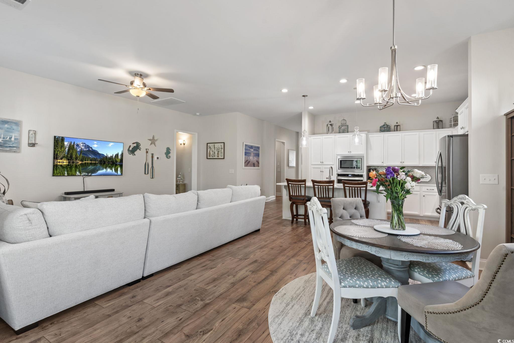 502 Bumble Circle Murrells Inlet, SC 29576 - Photo 18 of 39 Dining space featuring ceiling fan with notable ch