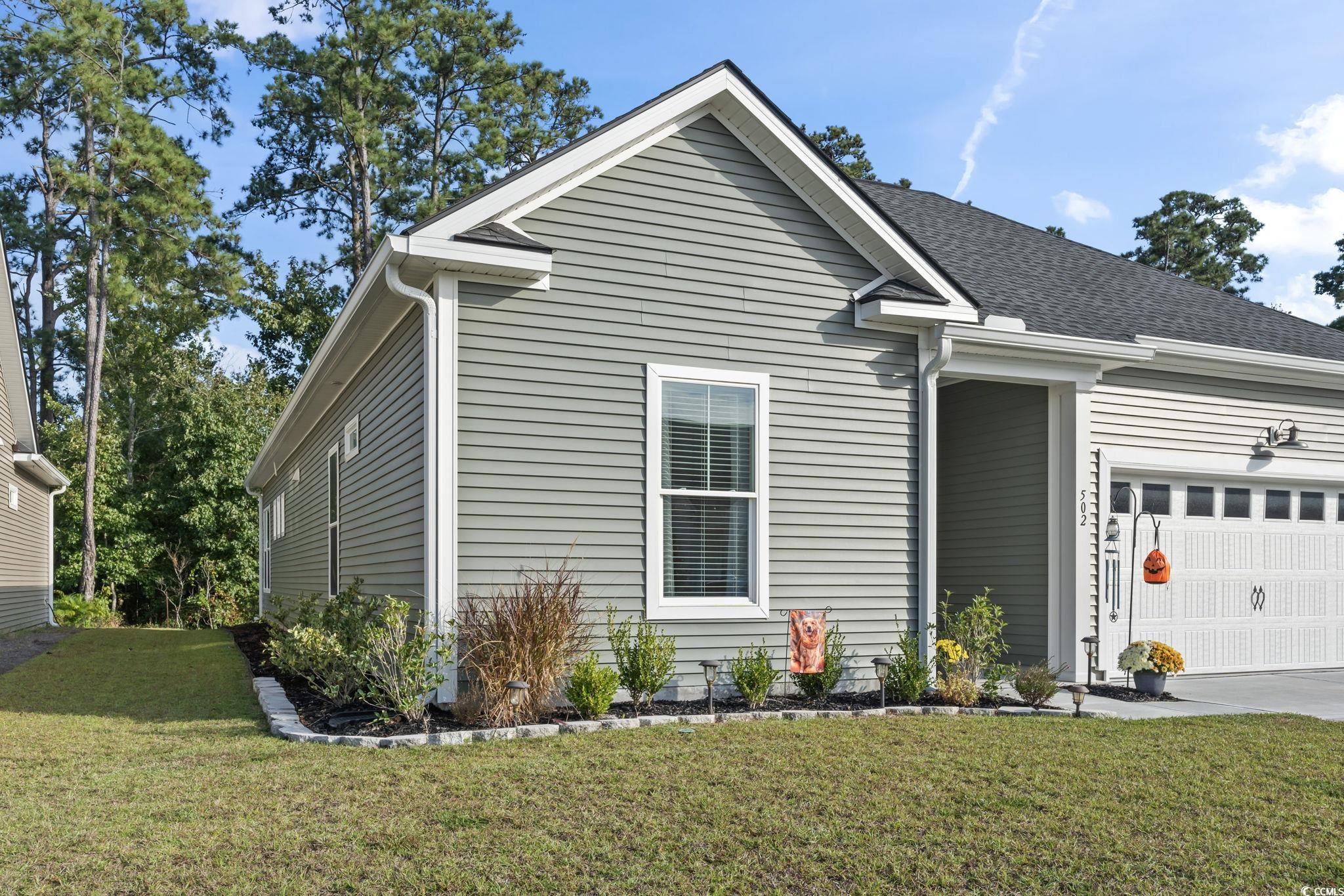 502 Bumble Circle Murrells Inlet, SC 29576 - Photo 33 of 39 View of front of house with a front yard and a gar