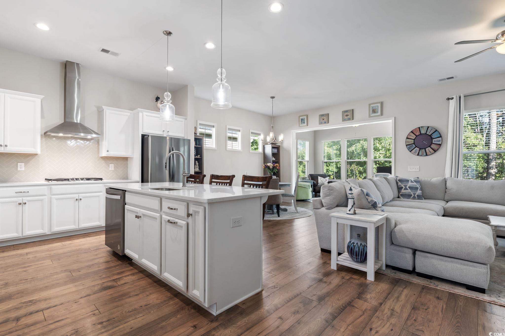 502 Bumble Circle Murrells Inlet, SC 29576 - Photo 6 of 39 Kitchen featuring a healthy amount of sunlight, wa