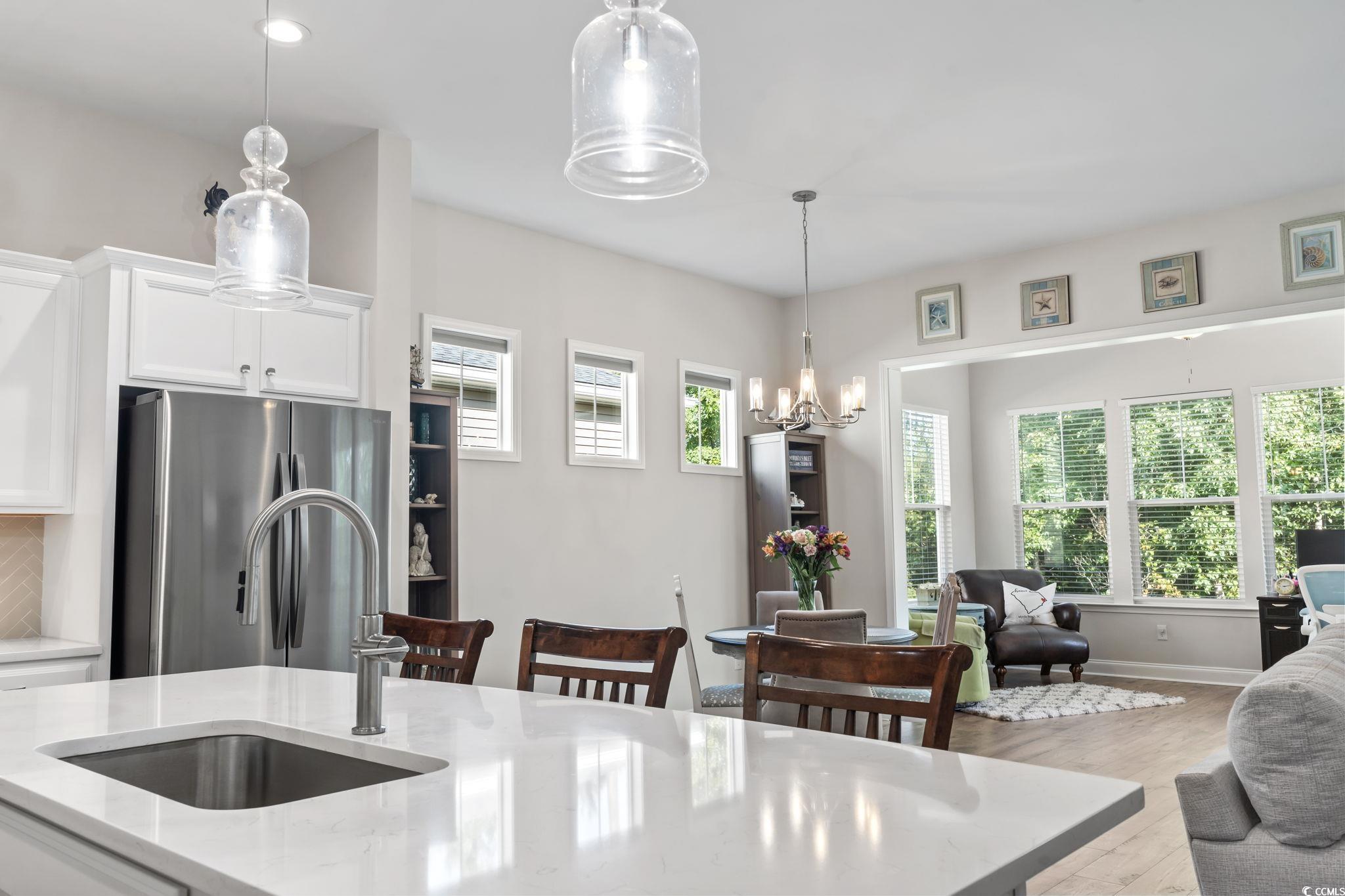 502 Bumble Circle Murrells Inlet, SC 29576 - Photo 9 of 39 Kitchen with light hardwood / wood-style flooring,