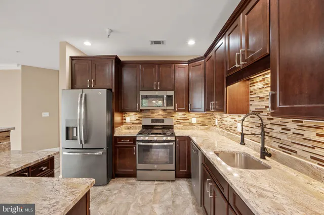 $449,000 | 1621 Ladue Court, Unit 105, Woodbridge, VA 22191