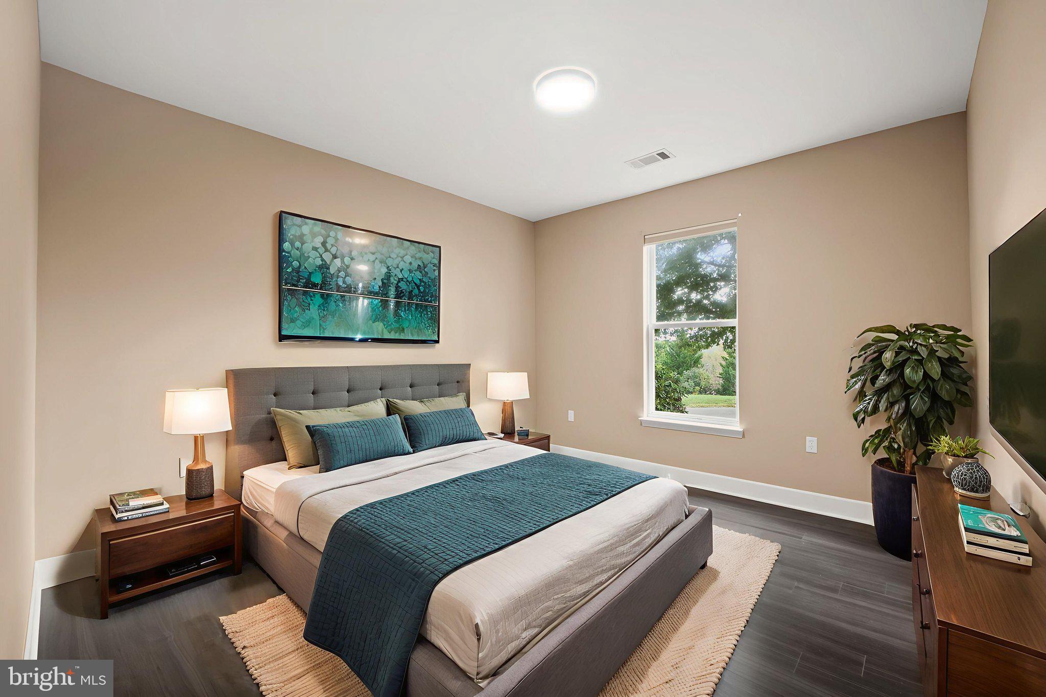 1621 Ladue Court, Unit 105 Woodbridge, VA 22191 - Photo 28 of 60 a bedroom with a bed and a window