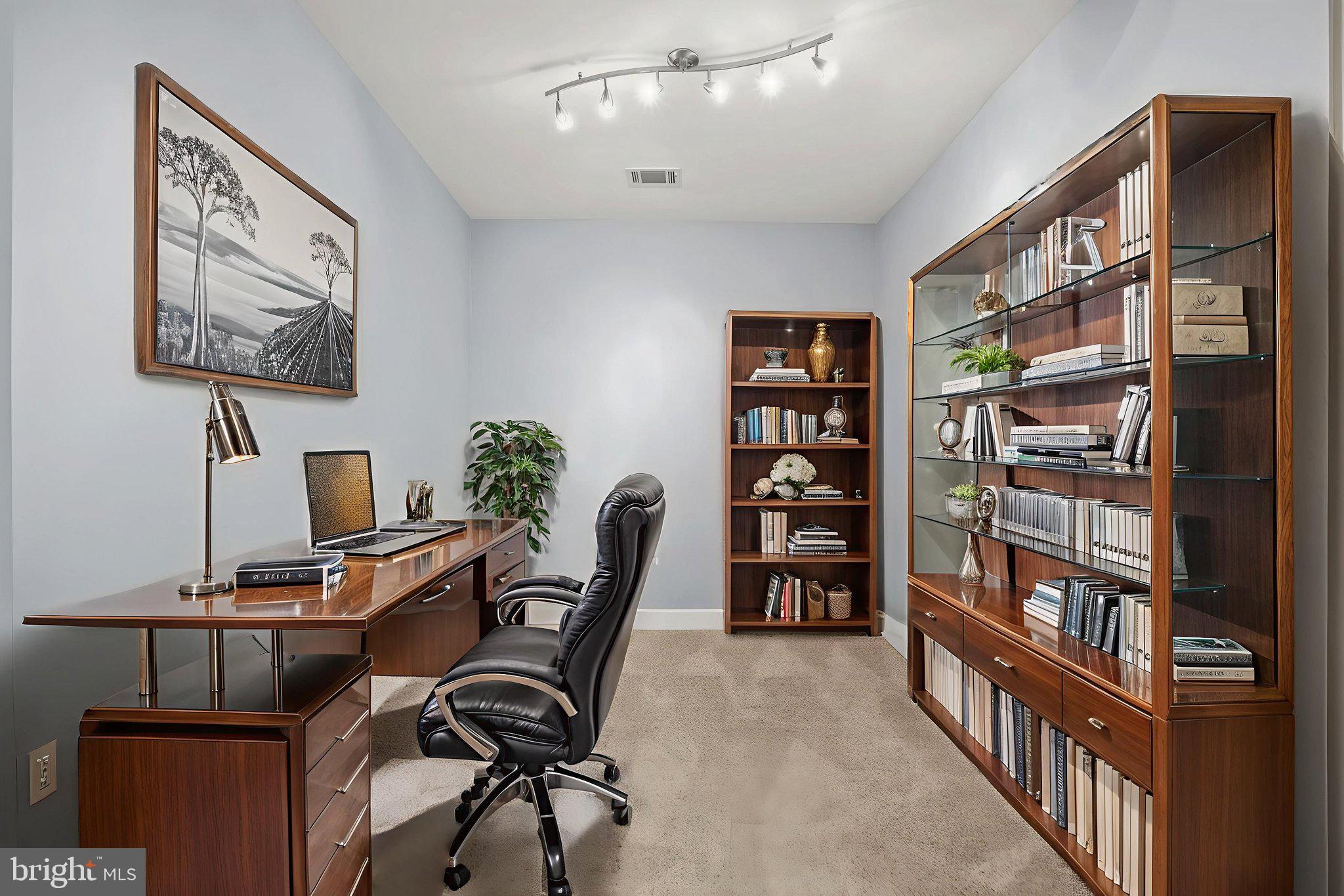 1621 Ladue Court, Unit 105 Woodbridge, VA 22191 - Photo 33 of 60 a view of a workspace with bookshelf