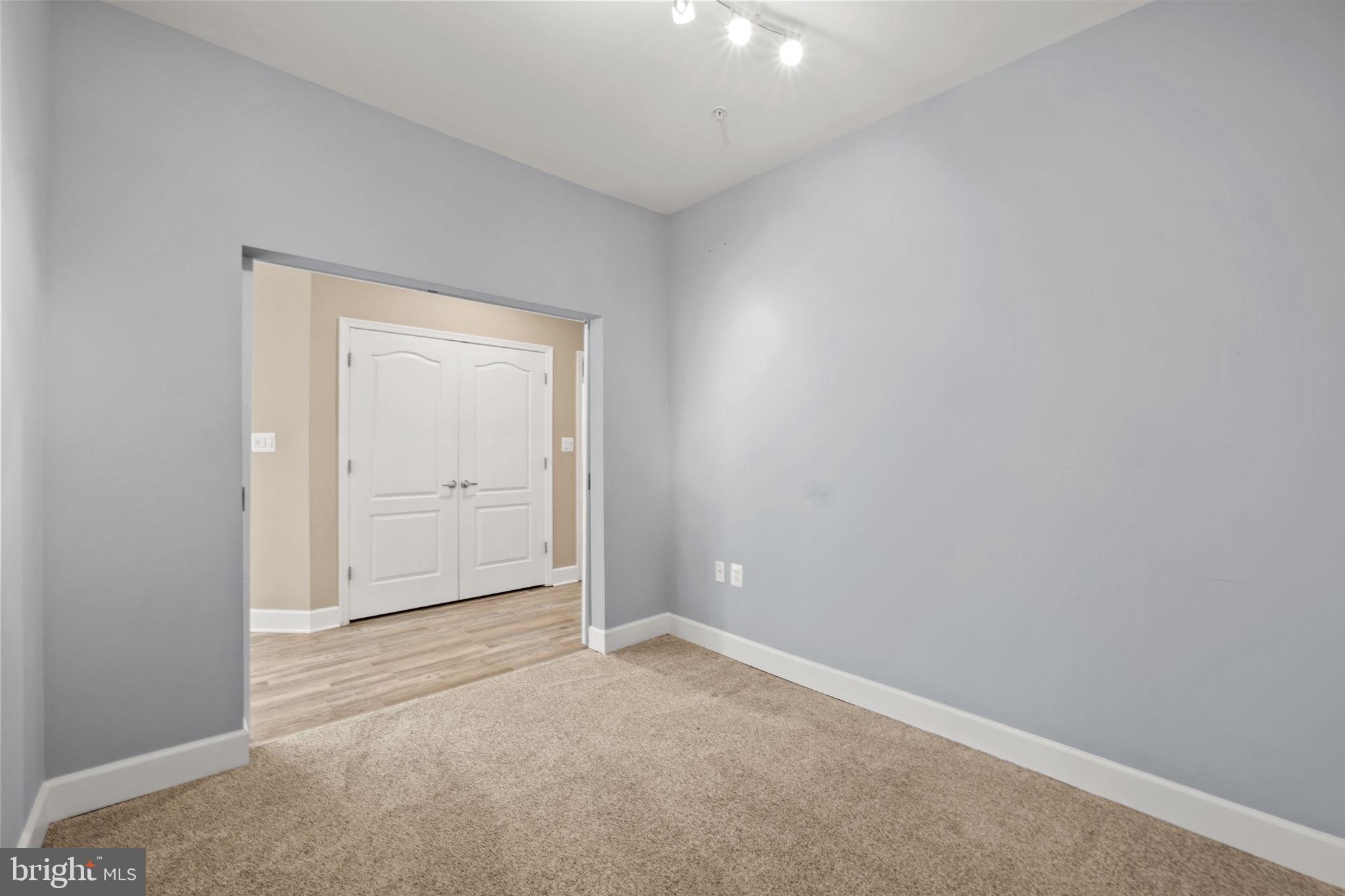 1621 Ladue Court, Unit 105 Woodbridge, VA 22191 - Photo 35 of 60 an empty room with closet area