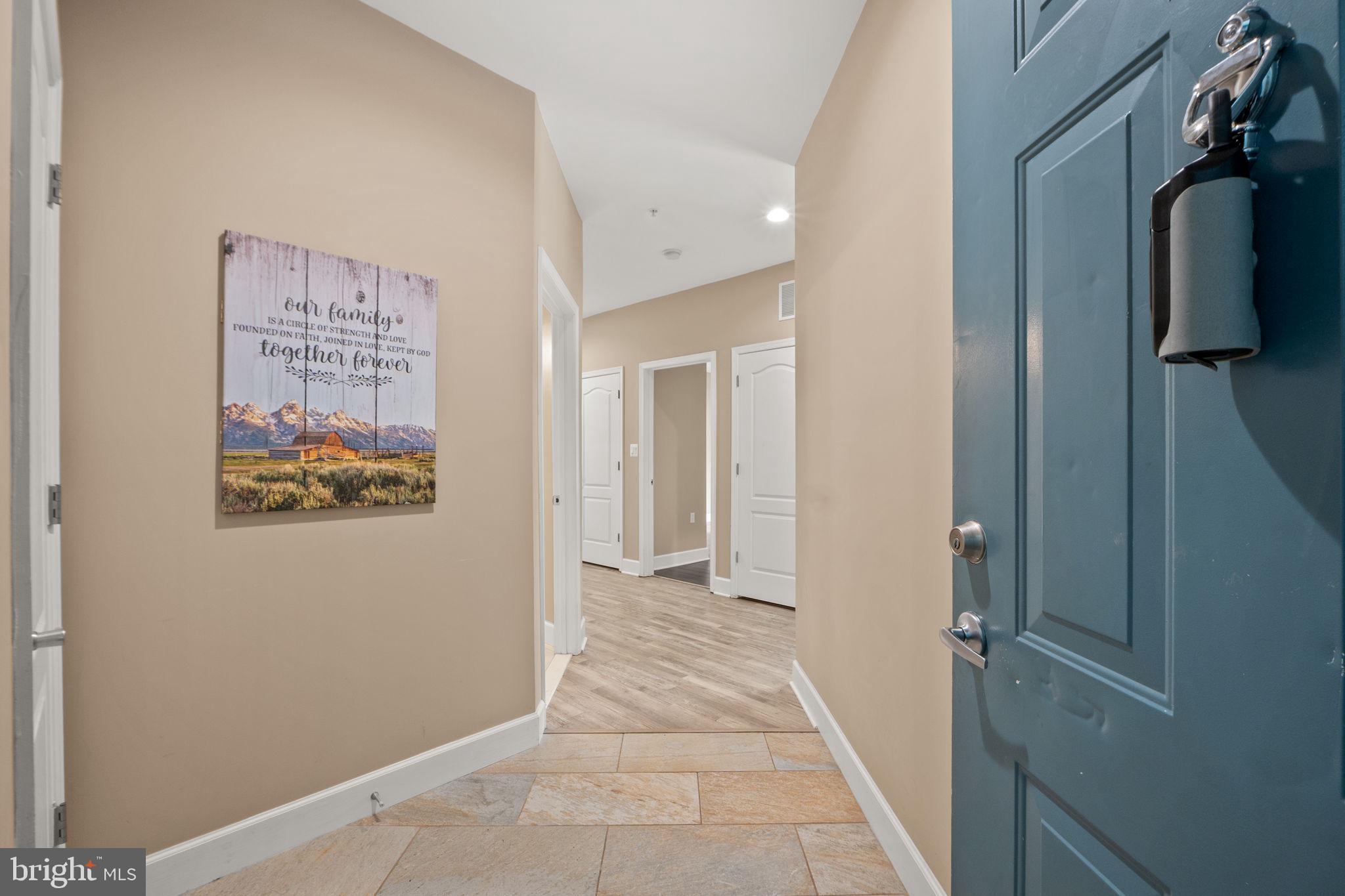1621 Ladue Court, Unit 105 Woodbridge, VA 22191 - Photo 38 of 60 a view of a hallway with closet