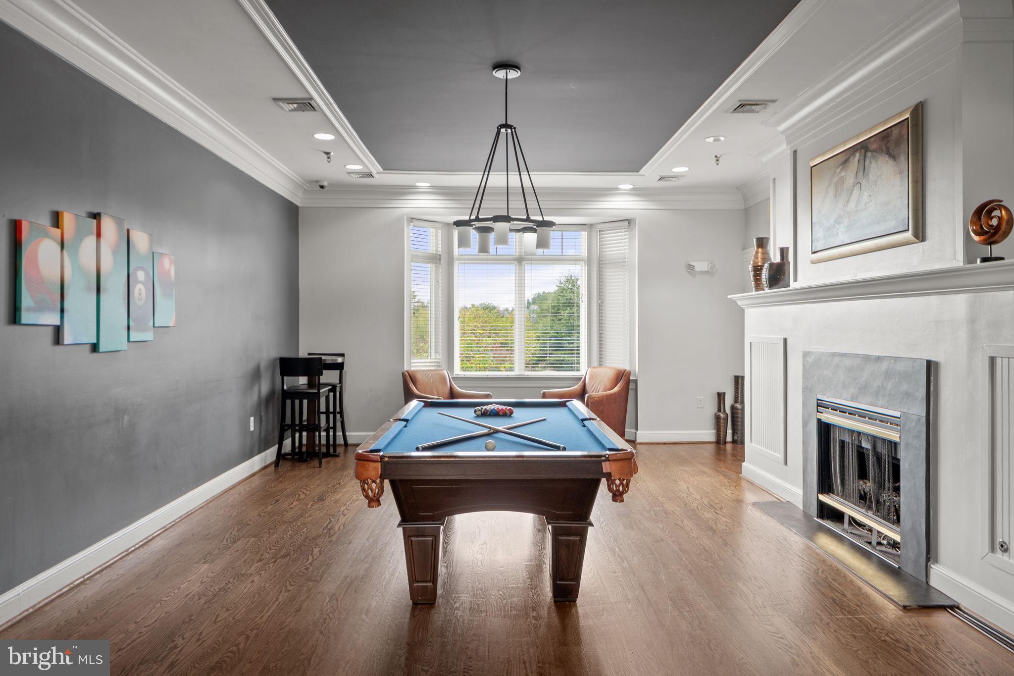 1621 Ladue Court, Unit 105 Woodbridge, VA 22191 - Photo 50 of 60 a dining room with furniture window and wooden floor
