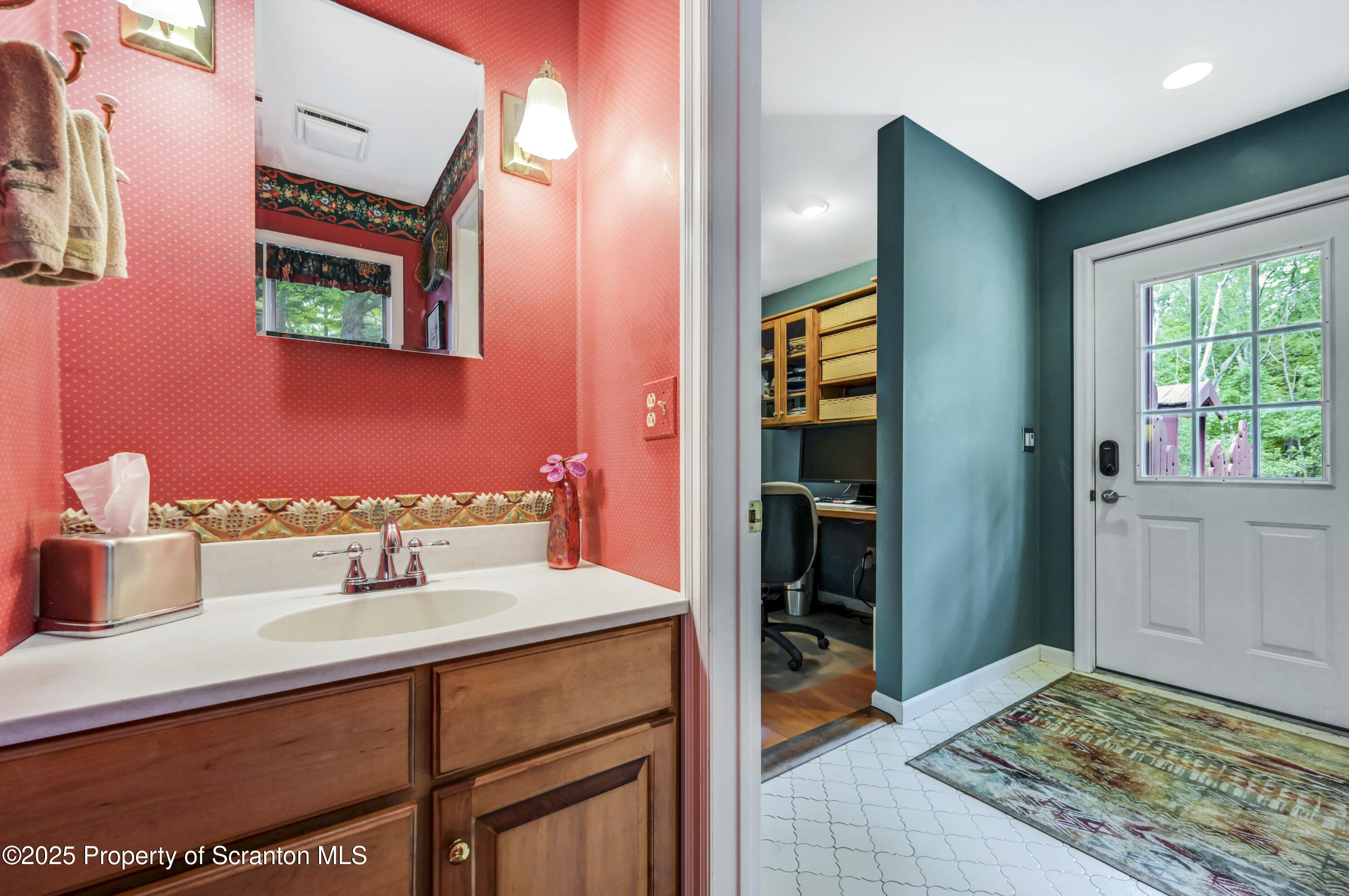 353 Benton Road Dalton, PA 18414 - Photo 22 of 78 a bathroom with a sink and a mirror