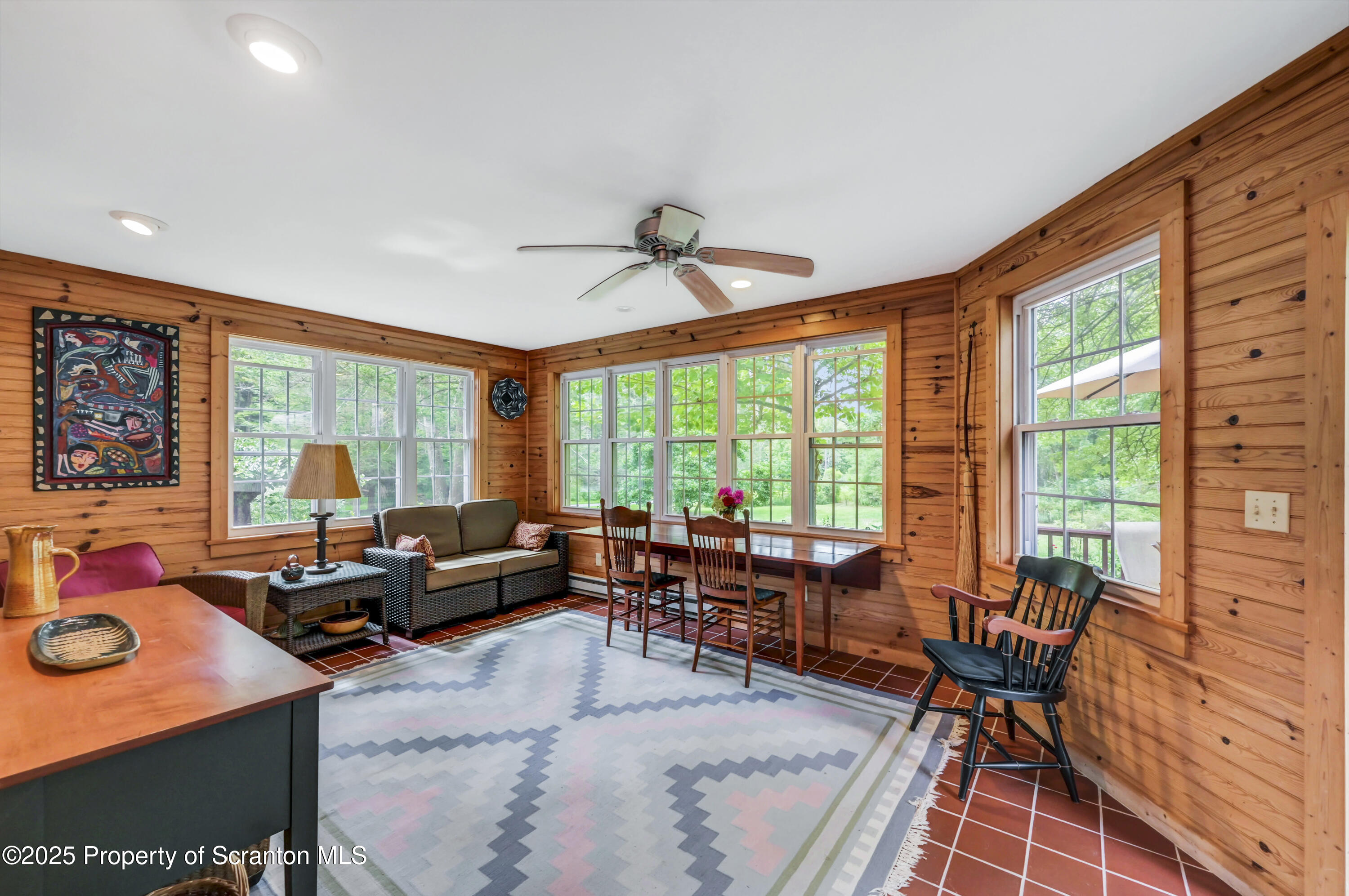 353 Benton Road Dalton, PA 18414 - Photo 23 of 78 a living room with furniture and a large window