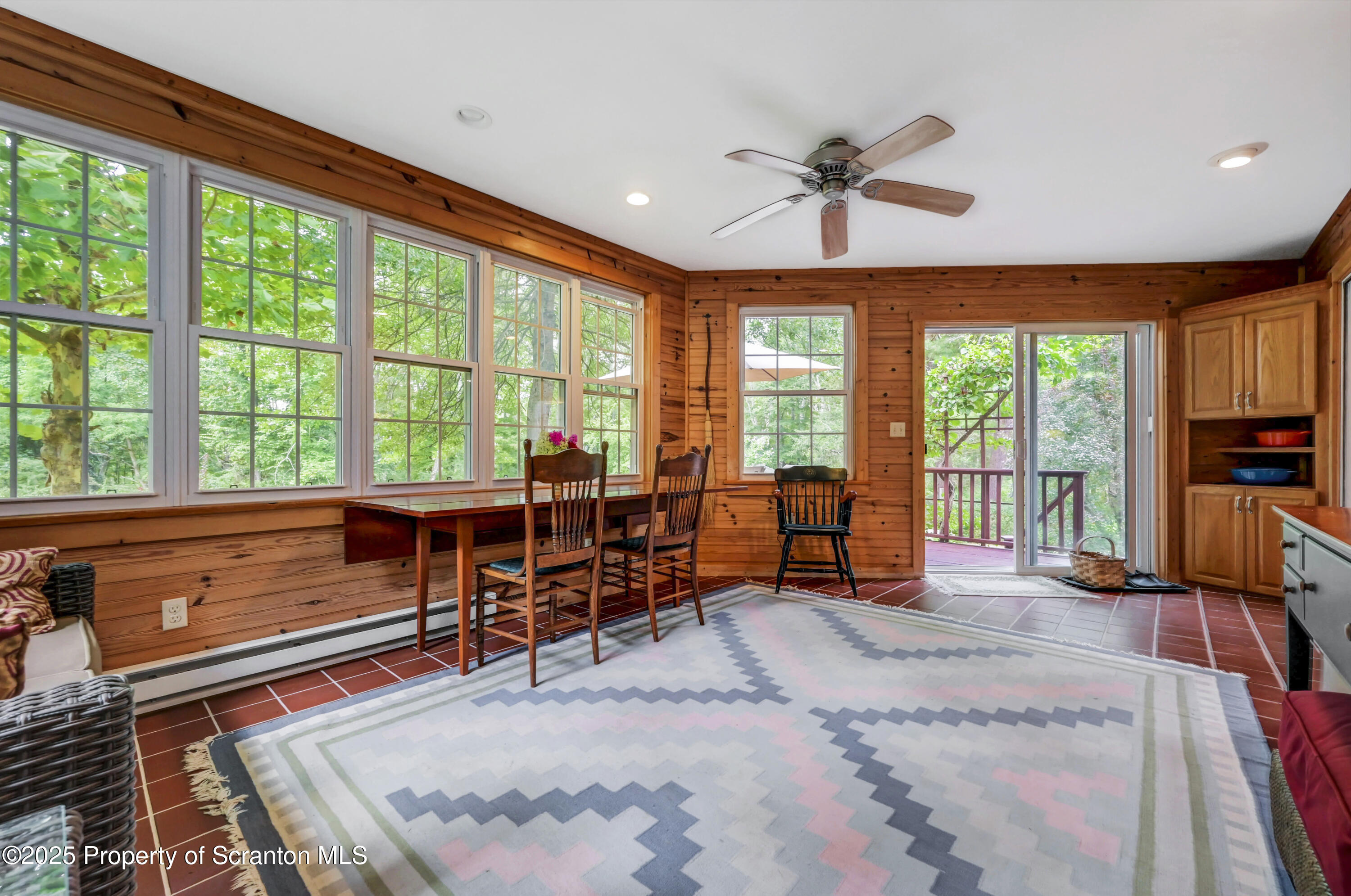 353 Benton Road Dalton, PA 18414 - Photo 24 of 78 a bed room with a bed and a large window