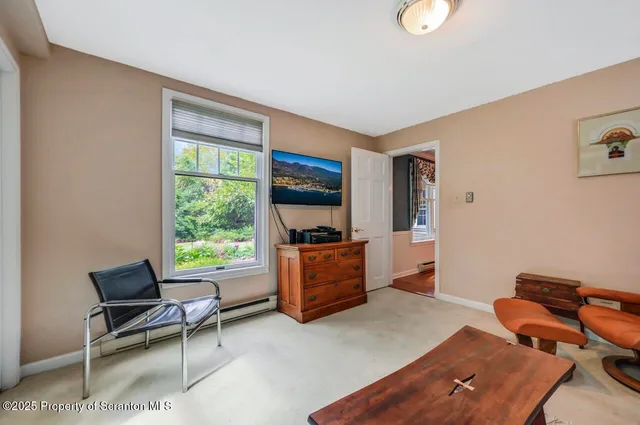 a living room with furniture and a couch