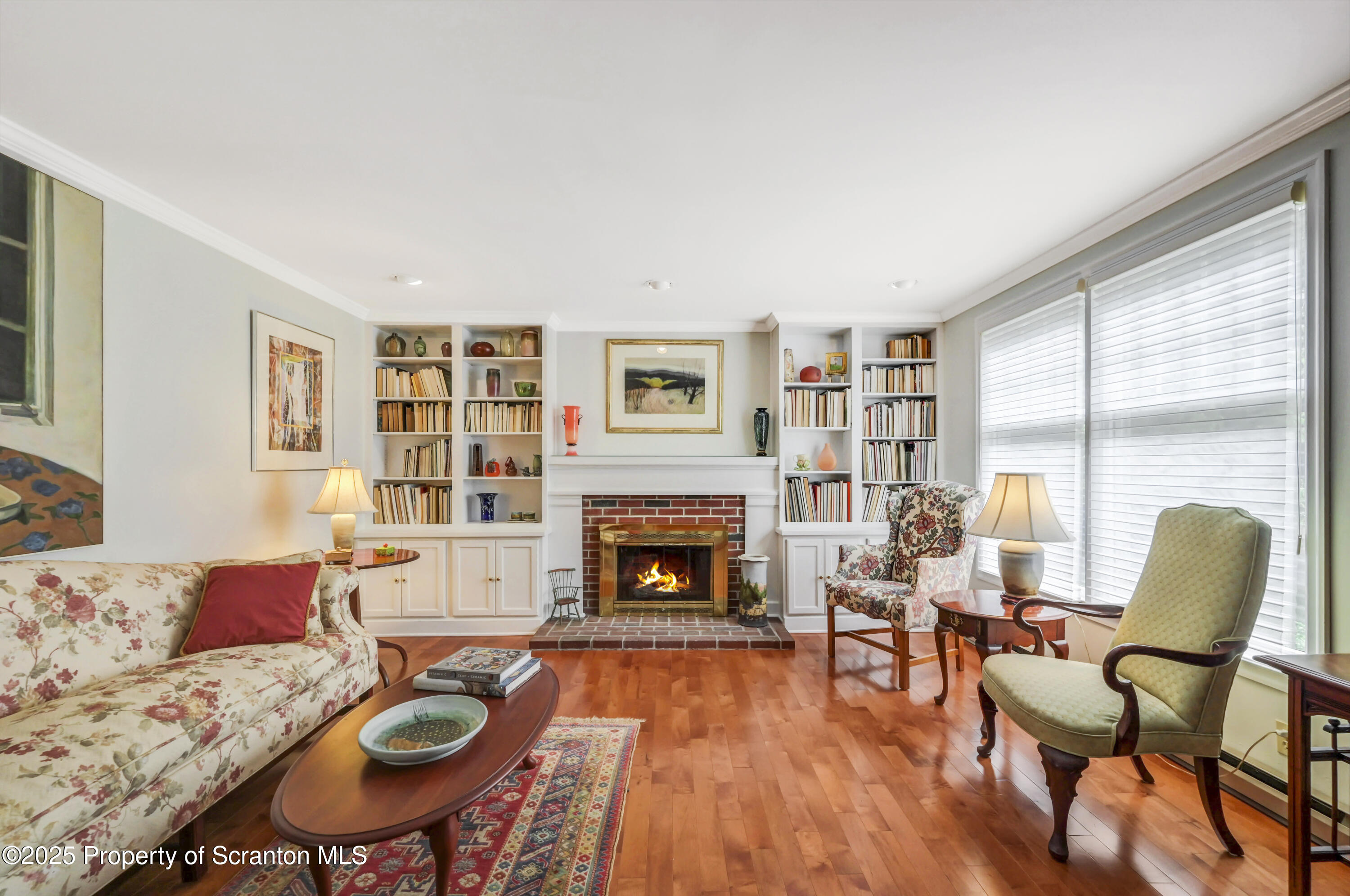 353 Benton Road Dalton, PA 18414 - Photo 5 of 78 a living room with furniture and a fireplace