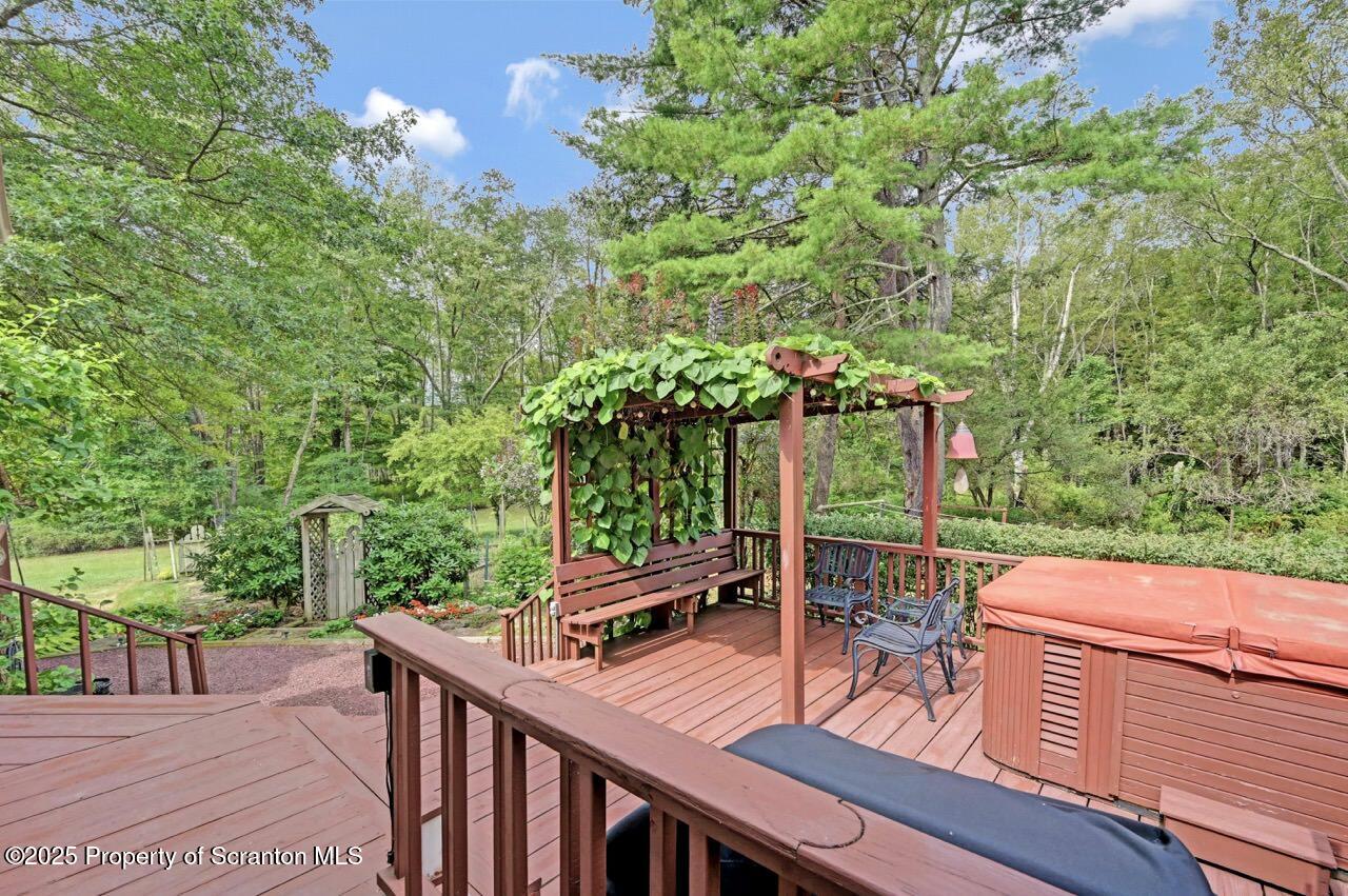 353 Benton Road Dalton, PA 18414 - Photo 53 of 78 a view of a chairs and table on the deck