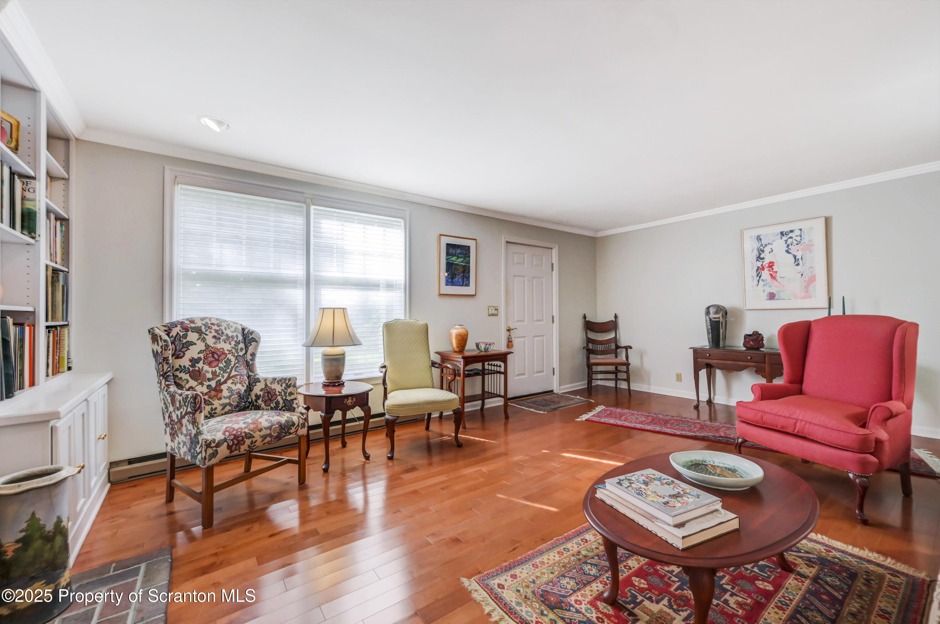 353 Benton Road Dalton, PA 18414 - Photo 7 of 78 a living room with furniture and wooden floor