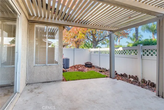 an empty room with fan