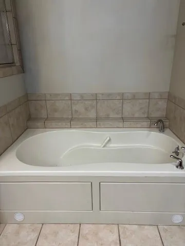 a bathroom with a bathtub