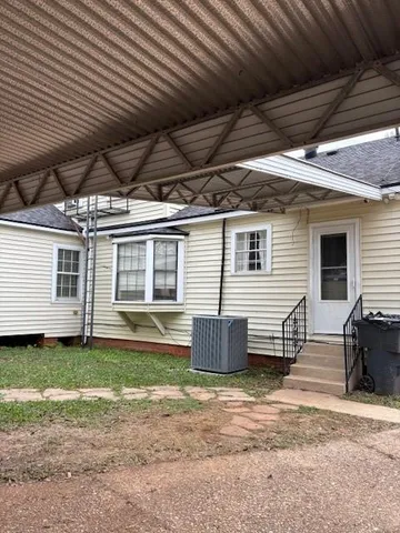 a view of a backyard of a house