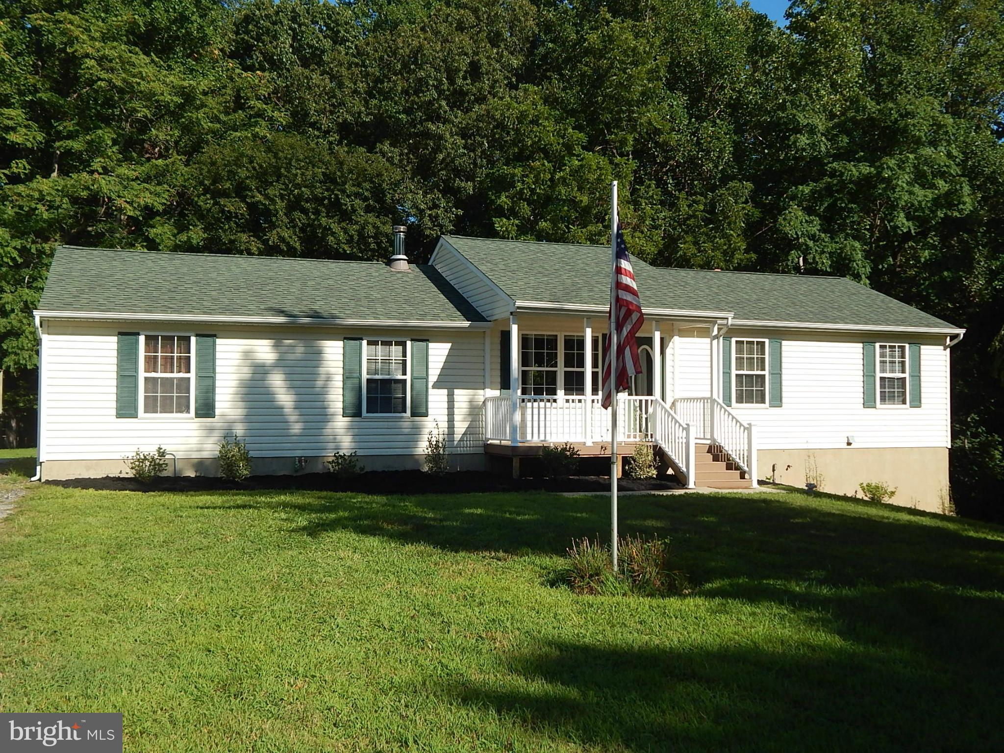 1615 Lottie Fowler Road Prince Frederick, MD 20678 - Photo 1 of 29 a front view of a house with a yard