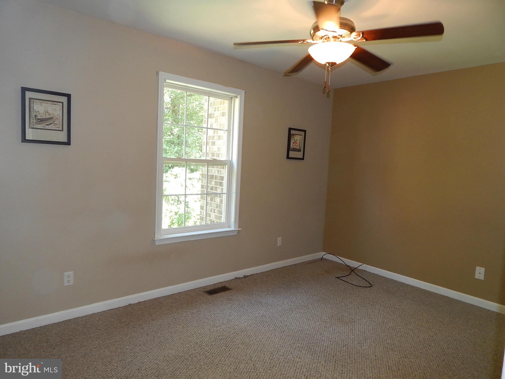 1615 Lottie Fowler Road Prince Frederick, MD 20678 - Photo 11 of 29 a view of an empty room with a window